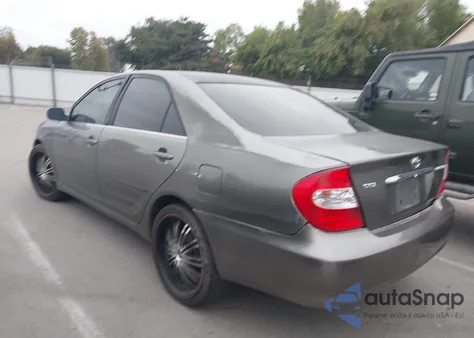 2003 Toyota Camry Le from USA, damaged, VIN JTDBE32K130230810